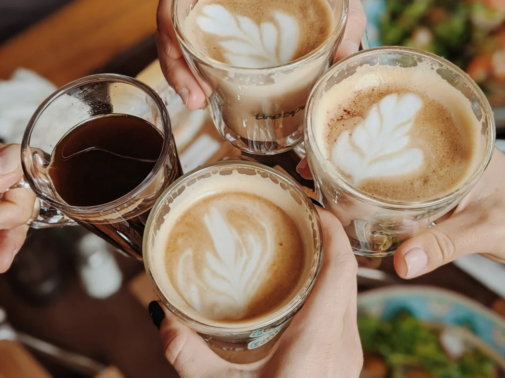 https://www.pexels.com/photo/people-with-four-drinking-glasses-of-coffee-while-making-a-toast-3361170/